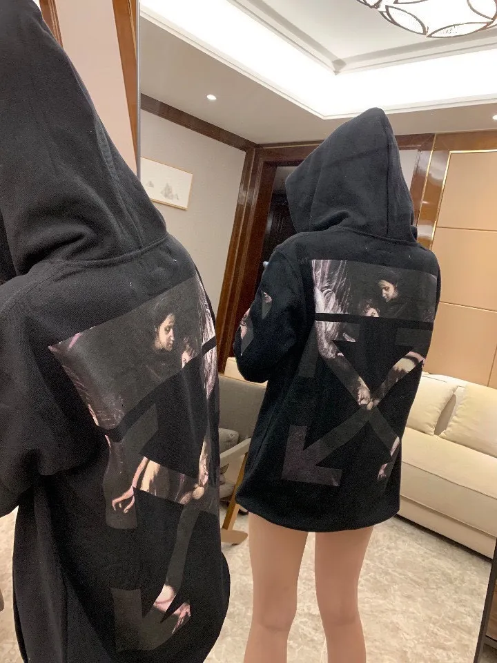 ♻️💯Reference model picture for the upper body❤️ Top tested version OFF WHITE OW Certified Angel Wings Madonna religious oil painting men's and women's round neck zipper cardigan sweatshirt. The A mark on the collar is a 3M reflective mark, customized model, not an embroidery mark, first look at the appraisal.  The Renaissance-themed Caravaggio Madonna oil painting is inspired by one of Caravaggio's famous oil paintings, with a strong religious color! World treasures, top-notch paintings, and walking art pieces follow the original craftsmanship and use 5-color glue to create an effect. It is not offset printing, but many people on the market use Kornit direct inkjet instead. Whether it is the top version, touch the printing with your hand. The correct process is that it has a frosted feel. This is also a way to identify the uniqueness of the product. The fabric is 100% combed cotton terry fabric, 480 grams, ensuring the originality of the craftsmanship! Secondly, the tag rope of this model hangs from the collar tag, not the side rope. Customized auxiliary materials, complete accessories, consistent zp, hang tags, collar labels, and washed labels, feel free to compare!   Color: Black White Size Chart